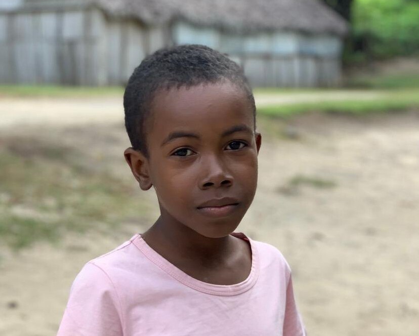 Schoolboy in front of building Madagascar