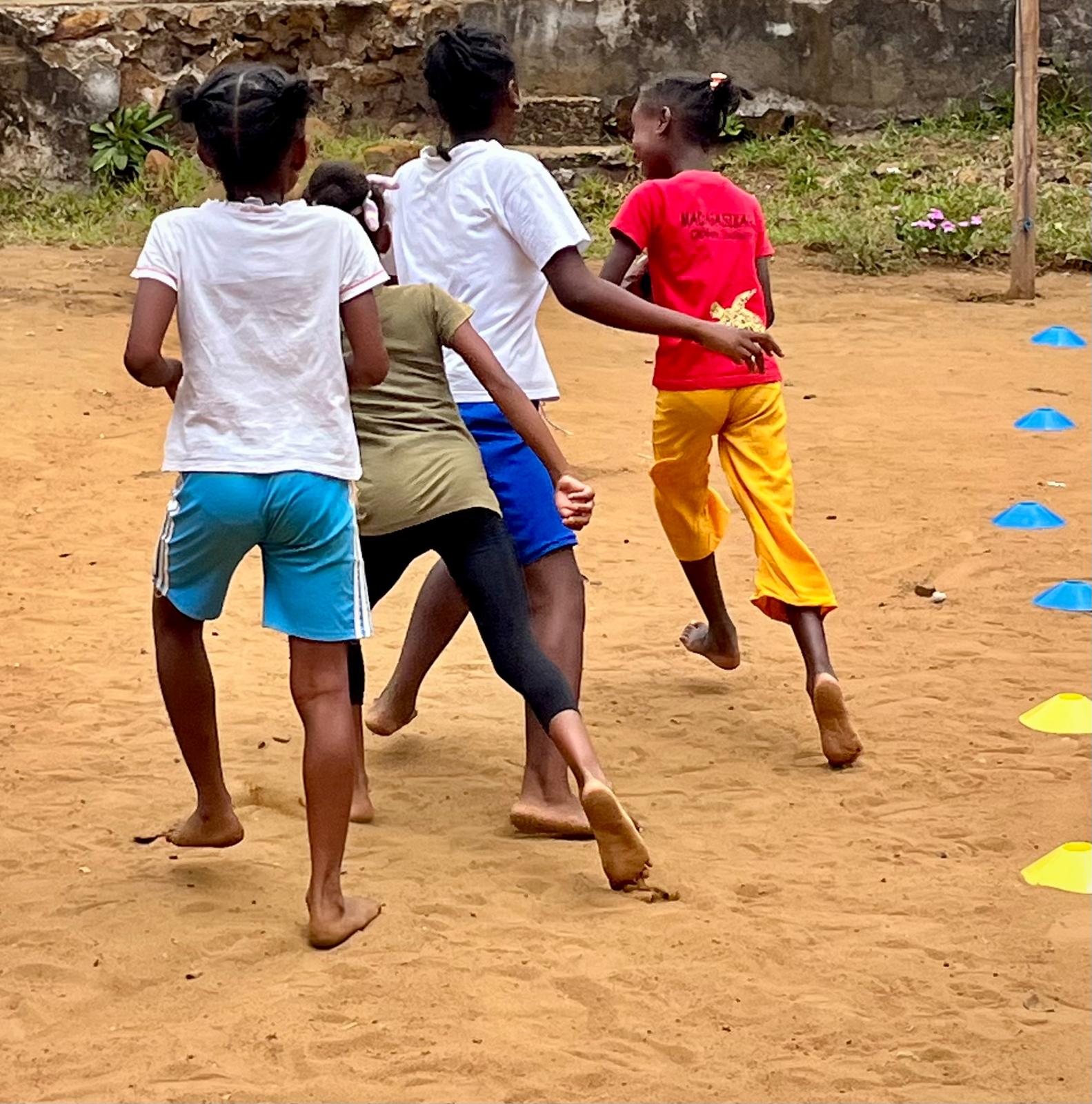 Children playing ball Ile Sainte Marie Madagascar