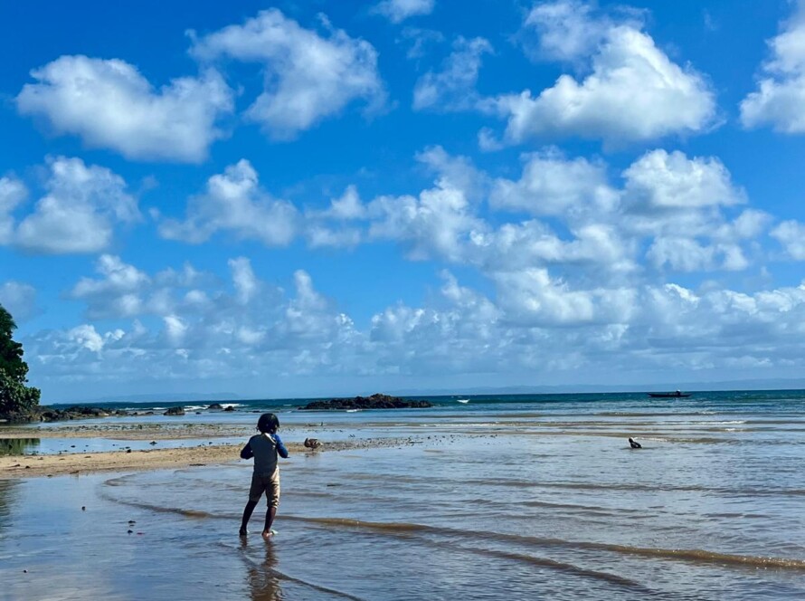 Little girl on the beach Ile Sainte Marie Madagascar