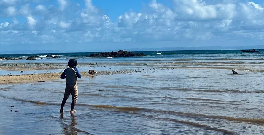 Little girl on the beach Ile Sainte Marie Madagascar