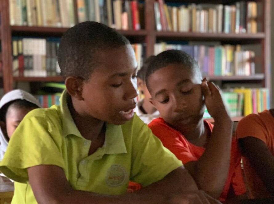 Boys studying Ile Sainte Marie Madagascar